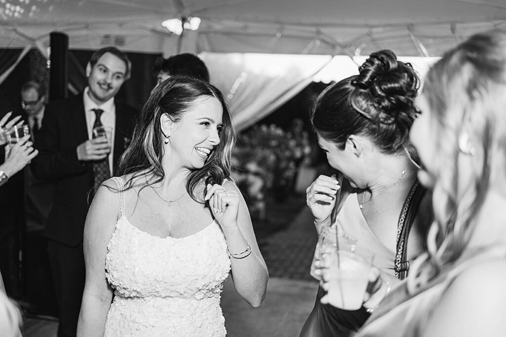 Dance floor celebration at Bayview Weddings at Gallagher Farms