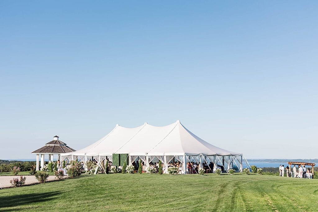 Bayview Weddings at Gallagher Farms reception with string lights and guests