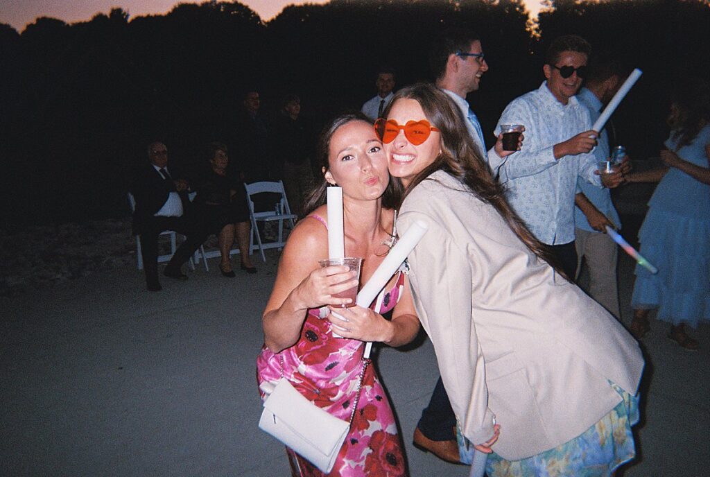 Joyful guest reactions during the wedding reception, photographed on disposable camera