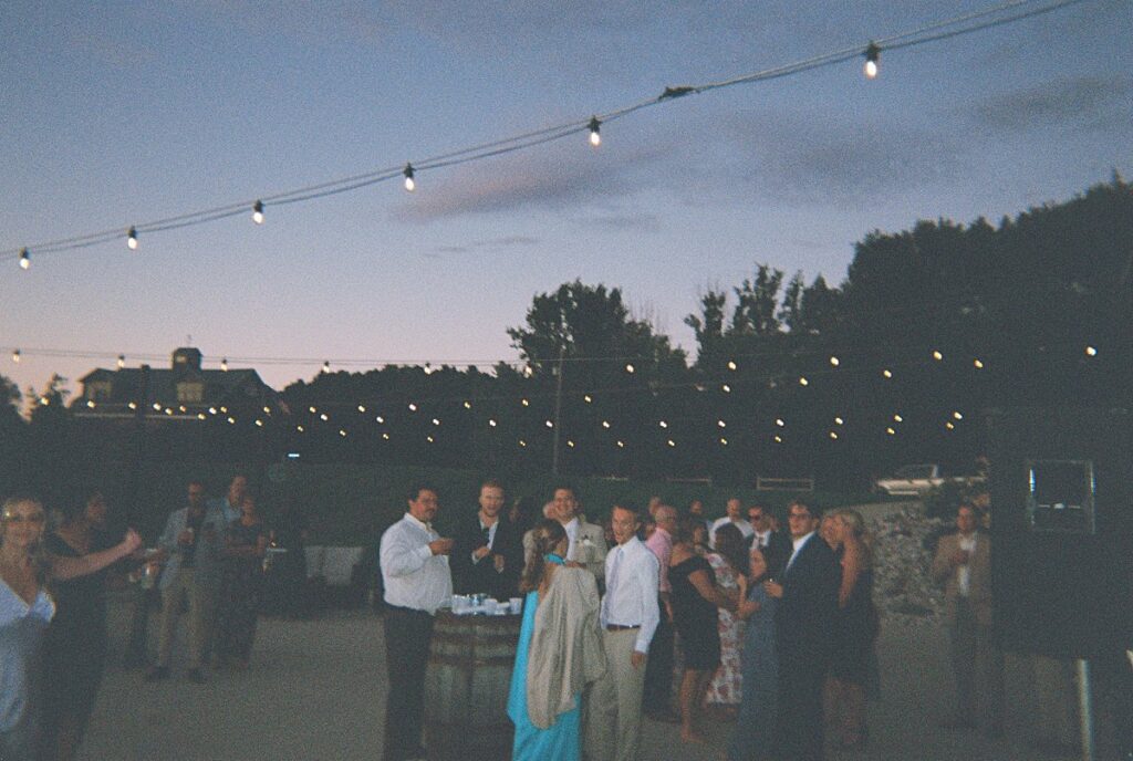 Wedding reception atmosphere at Heritage Wedding Barns captured on disposable camera