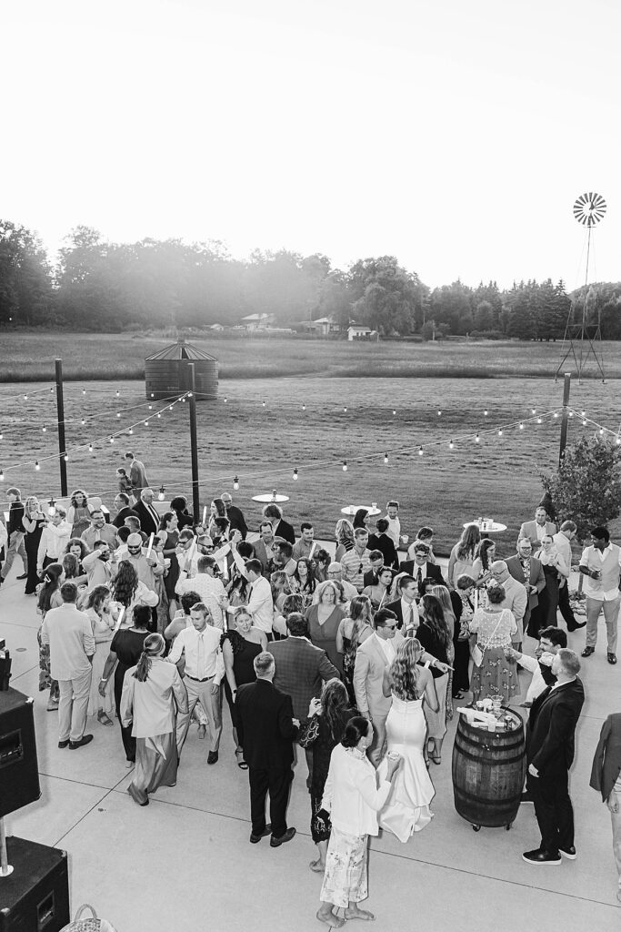 Black and white reception dancing moment at Heritage Wedding Barns