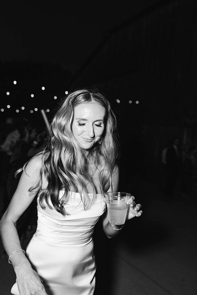 Black and white portrait of the bride during the reception