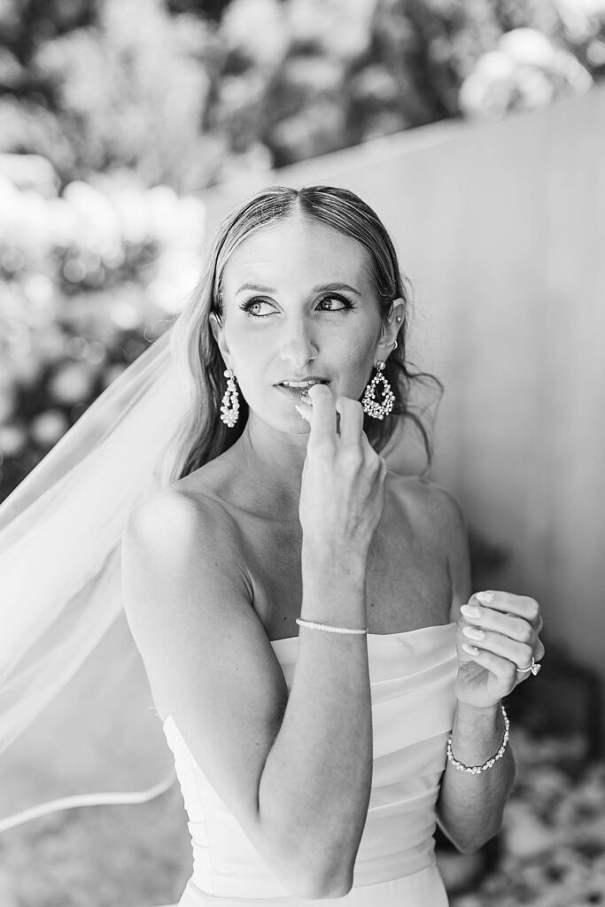 Black and white portrait of the bride in her wedding dress before the ceremony