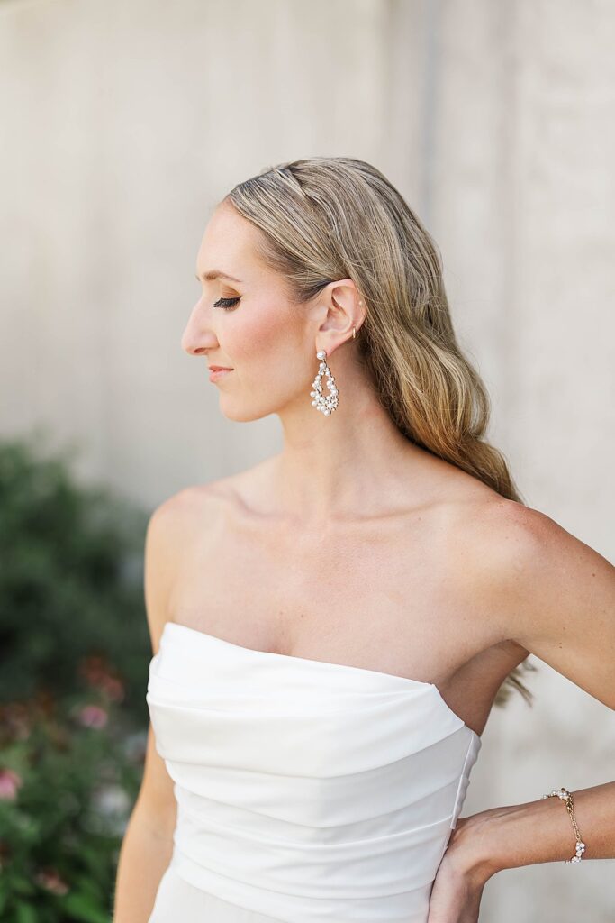 Bride in her wedding dress during getting ready at Heritage Wedding Barns