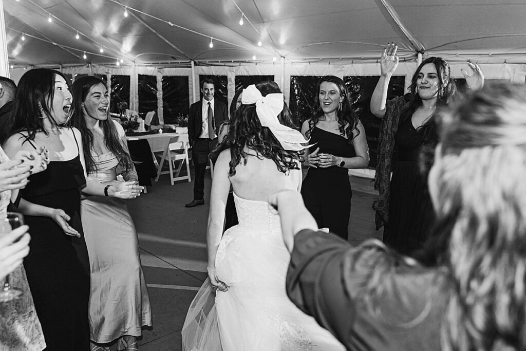 Bride and groom celebrating at their wedding reception