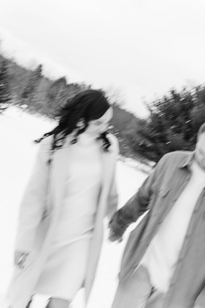Winter engagement photos at Olsen Bridge Trail in Northern Michigan