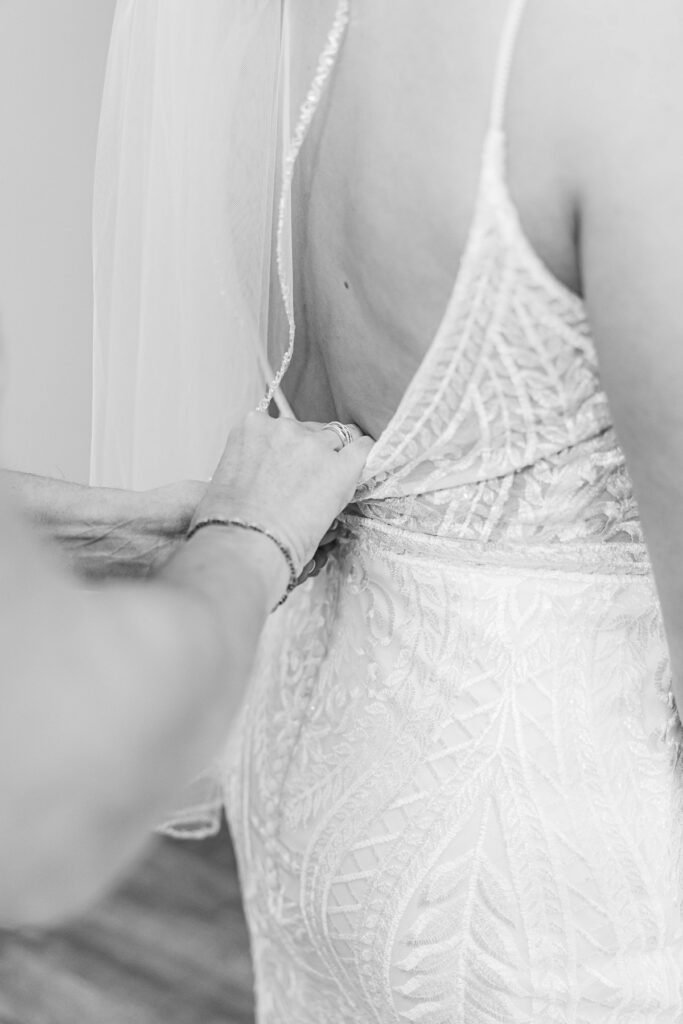 Wedding dress detail in bridal suite at BlueBridge Events Centre wedding venue near Traverse City Michigan