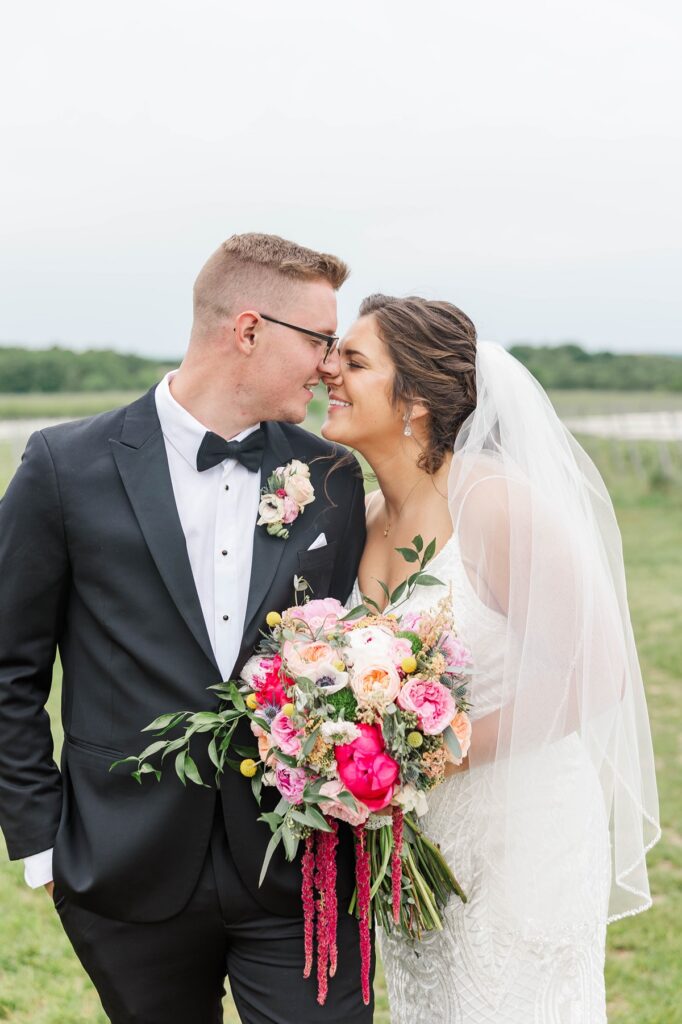 Bride and groom portrait at BlueBridge Events Centre wedding venue in Traverse City surrounded by Northern Michigan greenery