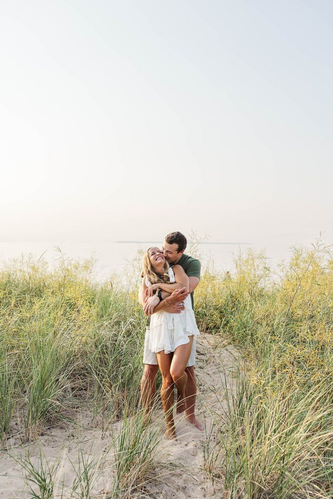 Northern Michigan engagement session in beach grass dunes near Lake Michigan