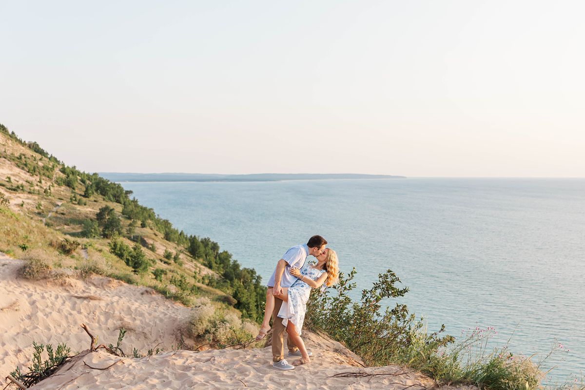 Couple at Empire Bluff Trail overlook at Sleeping Bear Dunes, one of the most beautiful Northern Michigan engagement session locations