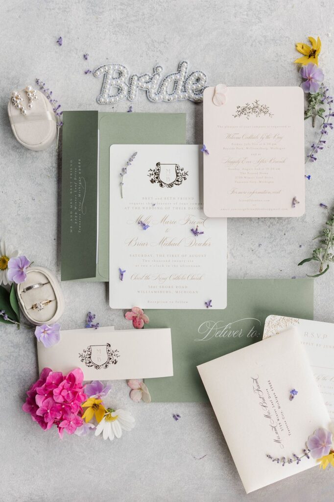 Northern Michigan wedding invitation suite and colorful floral details