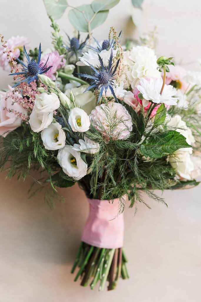 colorful bridal bouquet styled for wedding detail photos at Bayview Weddings at Gallagher Farms