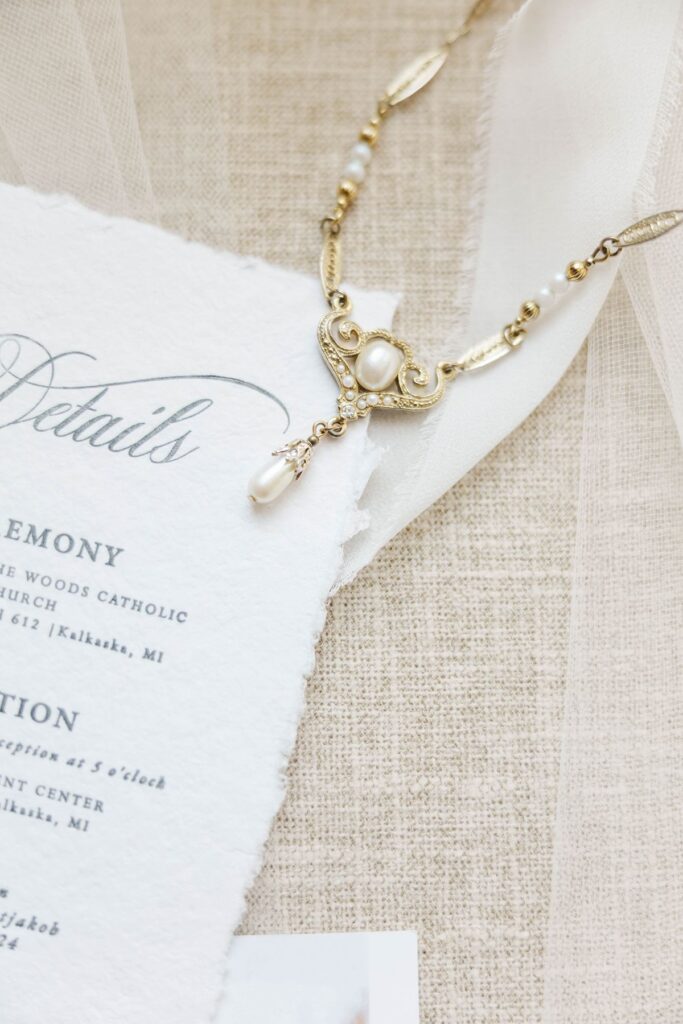 heirloom gold necklace passed down through family styled for wedding detail photos