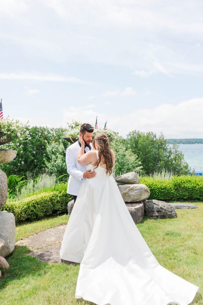 Bride and groom overlooking Torch Lake in Northern Michigan