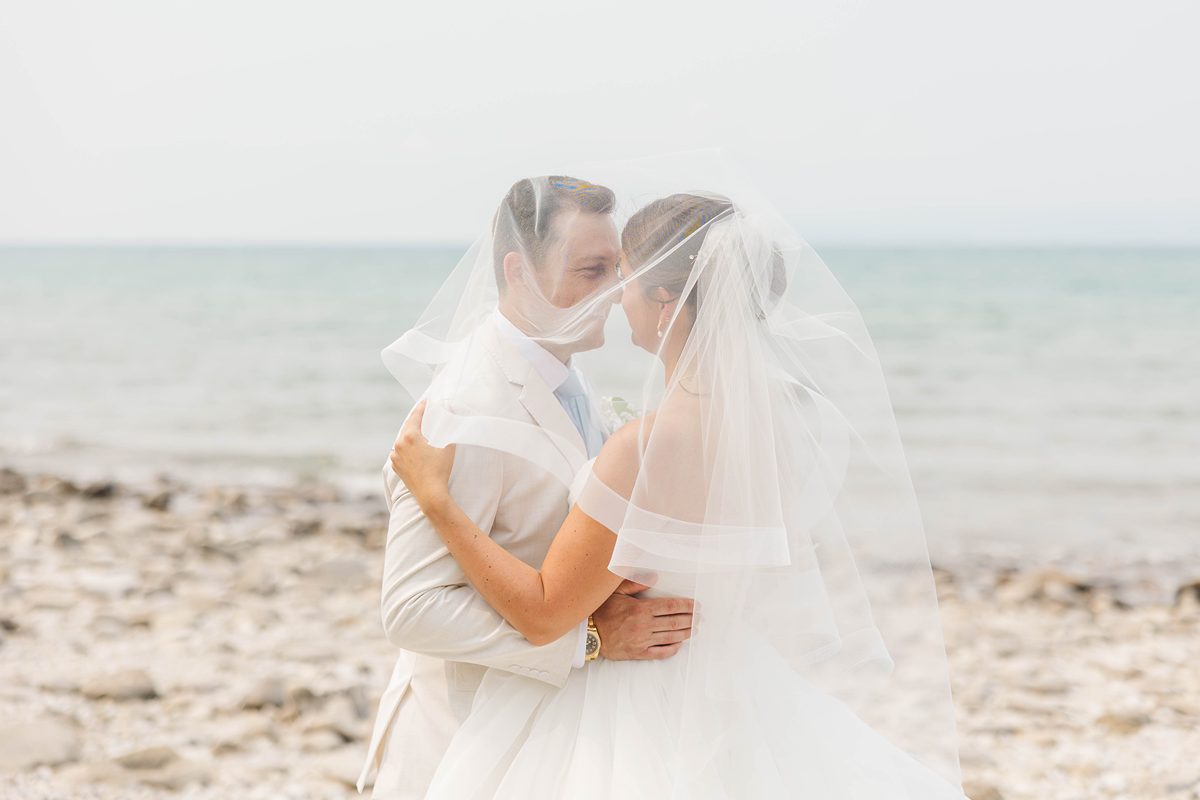 Bride and groom at a waterfront wedding venue in Northern Michigan