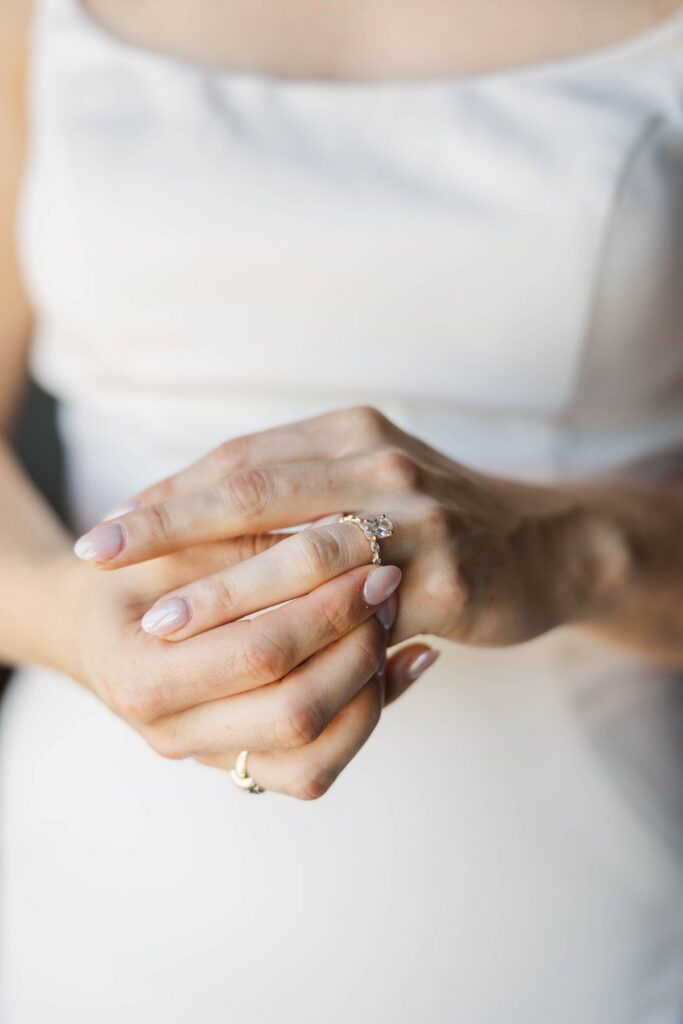 Bride wearing her wedding ring before her Lavender Hill Farm wedding