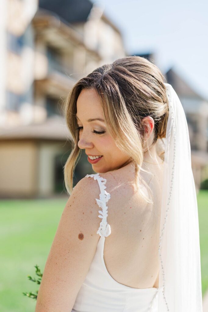 Bride smiling before her Lavender Hill Farm wedding at Boyne Mountain Resort