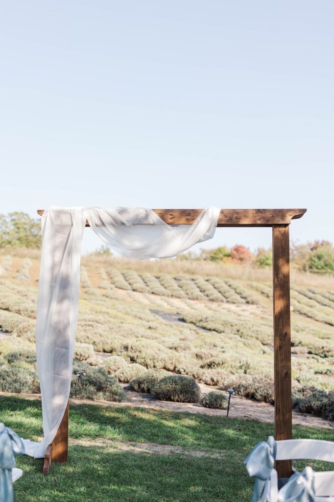 Ceremony arbor overlooking the lavender fields at a Lavender Hill Farm wedding