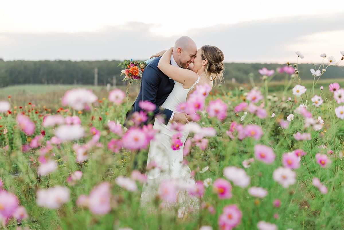 Bride and groom embracing during a Lavender Hill Farm wedding photographed by a Lavender Hill Farm wedding photographer