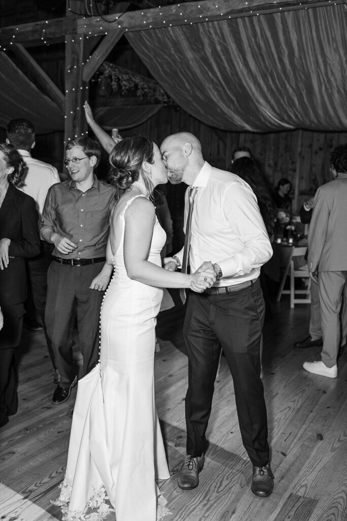 Bride and groom sharing a dance during their wedding reception at Lavender Hill Farm