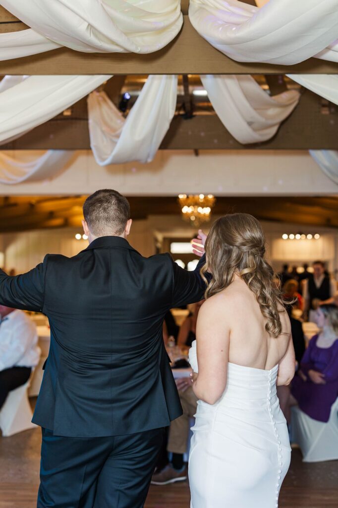 Madison and Jaxon thanking their wedding guests during the reception at Mill Pond Event Center in Kalkaska, Michigan.