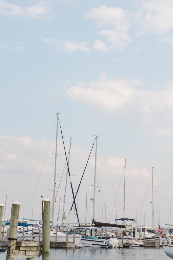 Sailboats docked along Grand Traverse Bay before a sunset sail in Traverse City